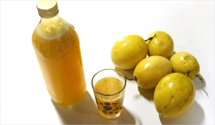 Passion fruit juice with whole fruits