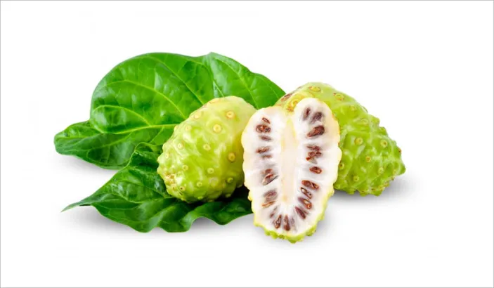 Whole noni and noni cut in half