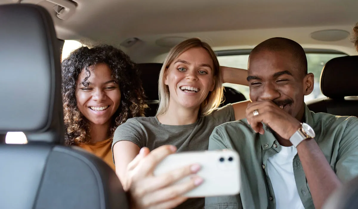 Family on vacation in a taxi Family on vacation in a taxi